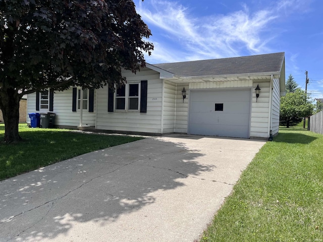 1705 Northview Blvd, Kokomo, IN 46901 - view of front facade with an attached garage, a front yard, concrete driveway, and roof with shingles