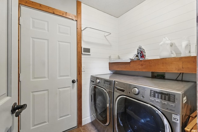2906 Easton Ridge Pl, Fort Wayne, IN 46818 - washroom featuring washing machine and clothes dryer and wood walls