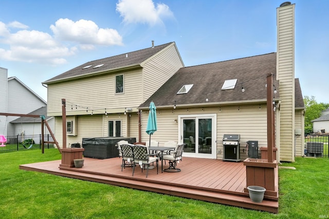 2906 Easton Ridge Pl, Fort Wayne, IN 46818 - rear view of property with a hot tub, a wooden deck, a chimney, and outdoor dining space