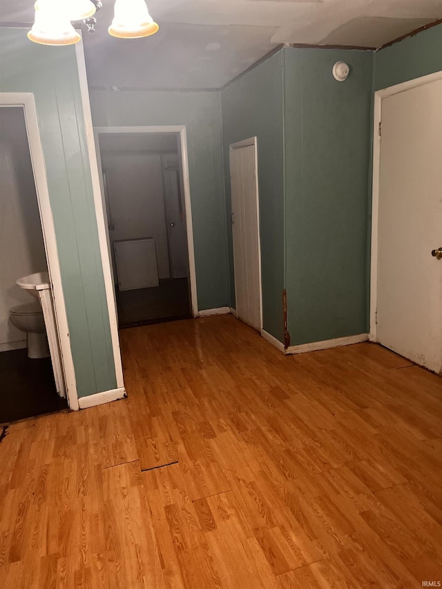 303 E N St, Winslow, IN 47598 - unfurnished room featuring light wood finished floors and a smoke detector