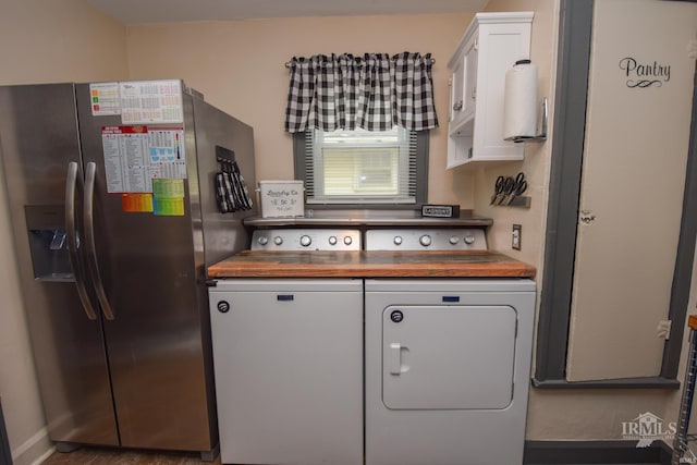 1816 W 13th St, Muncie, IN 47302 - washroom featuring cabinet space and separate washer and dryer