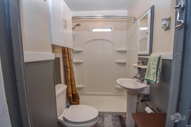 1816 W 13th St, Muncie, IN 47302 - full bathroom with toilet, a stall shower, and a sink