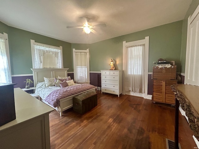 27 N Edwards St, Worthington, IN 47471 - bedroom with dark wood finished floors and a ceiling fan