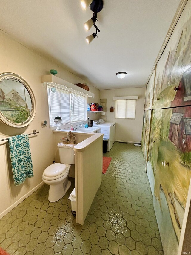 27 N Edwards St, Worthington, IN 47471 - kitchen featuring washing machine and dryer and tile patterned floors