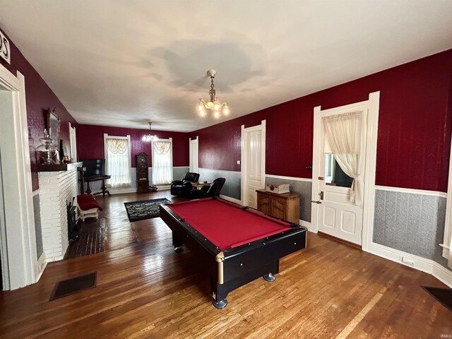 27 N Edwards St, Worthington, IN 47471 - game room with a chandelier, wood finished floors, wainscoting, billiards, and wallpapered walls