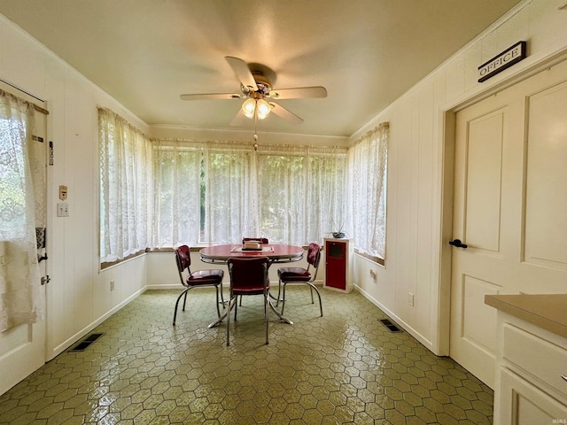 27 N Edwards St, Worthington, IN 47471 - dining space with healthy amount of natural light, a ceiling fan, and baseboards