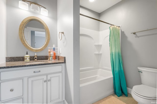 11070 Birch Lake Dr, Granger, IN 46530 - bathroom with toilet, shower / tub combo with curtain, vanity, tile patterned floors, and baseboards