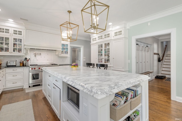11070 Birch Lake Dr, Granger, IN 46530 - kitchen featuring appliances with stainless steel finishes, a chandelier, a center island, recessed lighting, and dark wood-type flooring