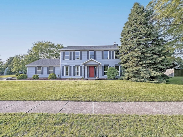 904 Brookridge Ct, Lafayette, IN 47909 - colonial house with a front lawn and a chimney