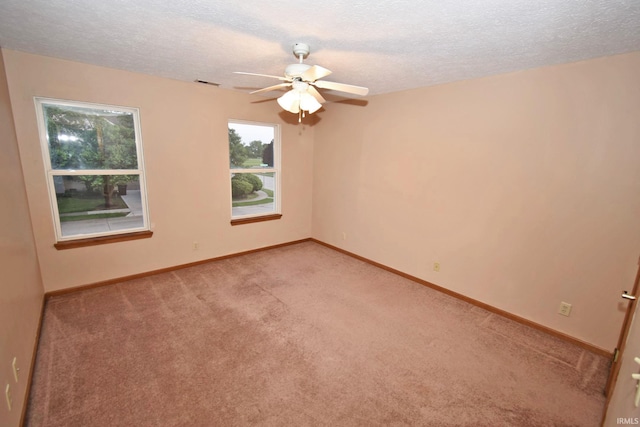 904 Brookridge Ct, Lafayette, IN 47909 - spare room with a ceiling fan, light colored carpet, a textured ceiling, and baseboards