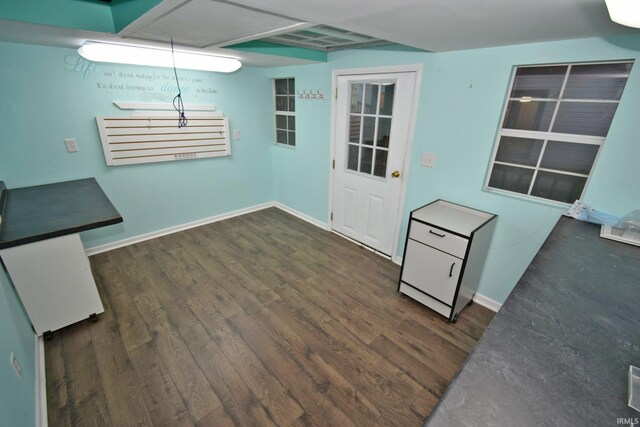 904 Brookridge Ct, Lafayette, IN 47909 - unfurnished dining area with dark wood finished floors and baseboards