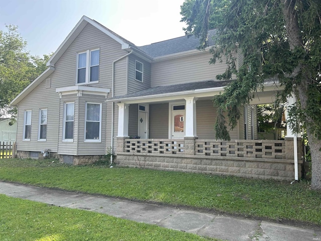 1000 Hartford St, Lafayette, IN 47900 - view of front facade with a porch and a front yard