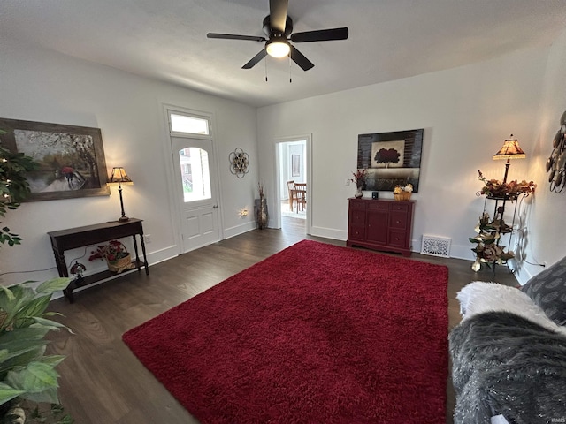 1000 Hartford St, Lafayette, IN 47900 - living room with wood finished floors, a ceiling fan, and baseboards
