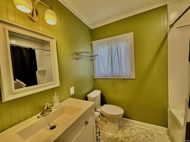 2424 S Webster St, Kokomo, IN 46902 - bathroom featuring vanity, toilet, crown molding, and baseboards