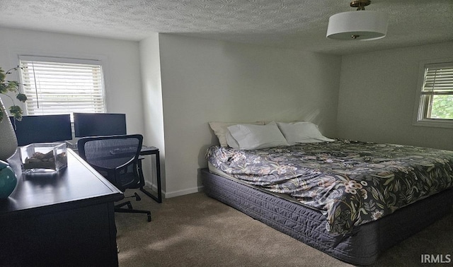 1101 E Boone St, Frankfort, IN 46041 - bedroom featuring carpet flooring, an office area, and a textured ceiling