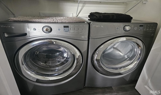 1101 E Boone St, Frankfort, IN 46041 - laundry area with independent washer and dryer and dark wood finished floors