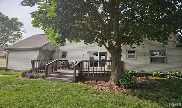 1101 E Boone St, Frankfort, IN 46041 - rear view of property featuring a wooden deck and a yard