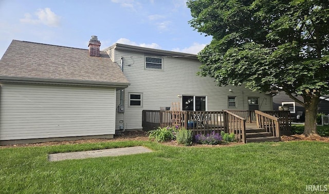 1101 E Boone St, Frankfort, IN 46041 - rear view of property with a yard, a deck, a chimney, and a shingled roof