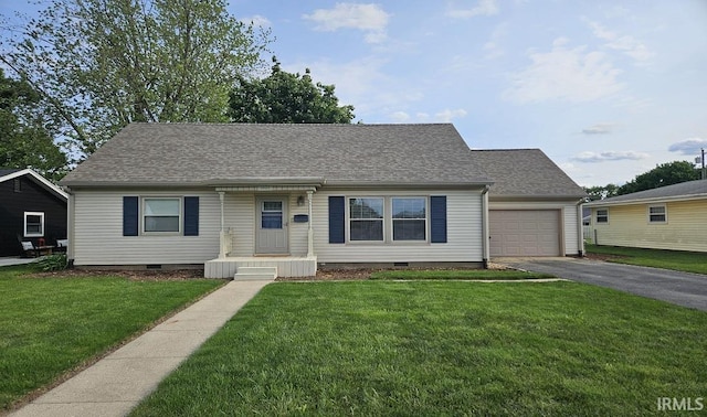1101 E Boone St, Frankfort, IN 46041 - view of front facade with driveway, crawl space, an attached garage, a front yard, and a shingled roof