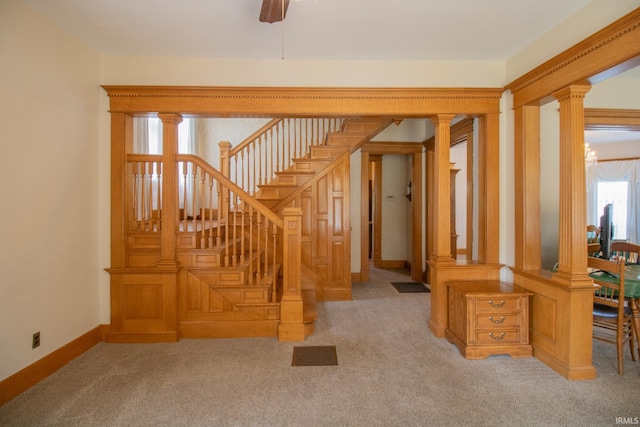 507 N Howard St, Union City, IN 47390 - staircase with carpet flooring, baseboards, ceiling fan, and a chandelier