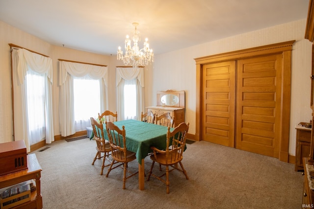 507 N Howard St, Union City, IN 47390 - carpeted dining space with a chandelier