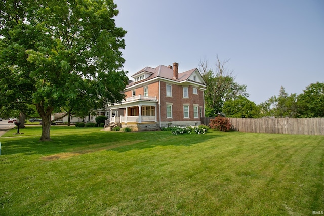 507 N Howard St, Union City, IN 47390 - view of side of property with a porch, brick siding, and a chimney