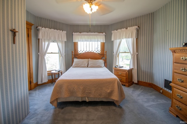 507 N Howard St, Union City, IN 47390 - carpeted bedroom with wallpapered walls, ceiling fan, and baseboards