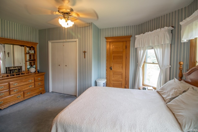 507 N Howard St, Union City, IN 47390 - carpeted bedroom featuring wallpapered walls, a closet, and a ceiling fan