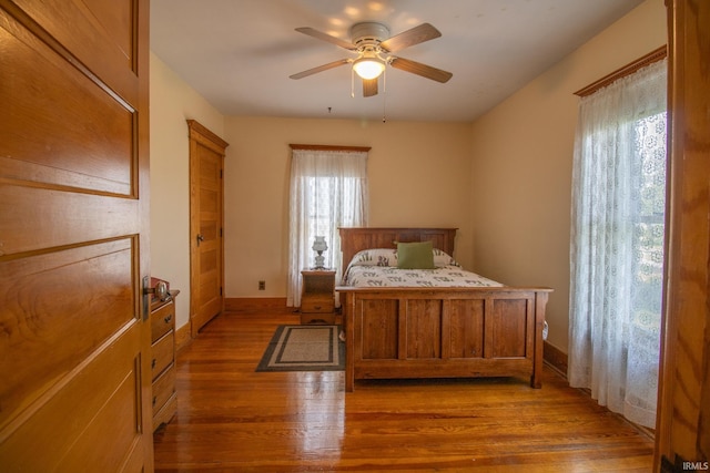 507 N Howard St, Union City, IN 47390 - bedroom featuring wood finished floors, baseboards, and ceiling fan
