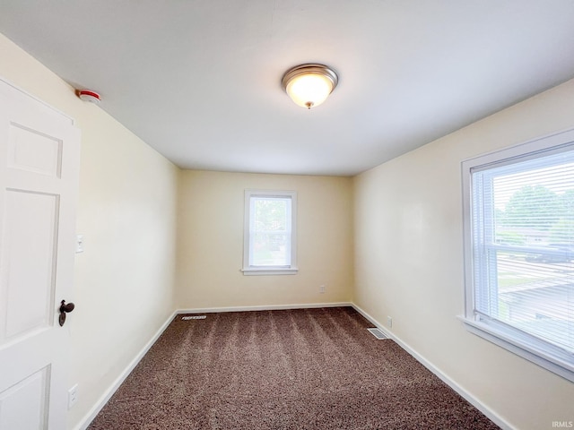 158 Simpson Ave, Elkhart, IN 46516 - carpeted empty room with baseboards