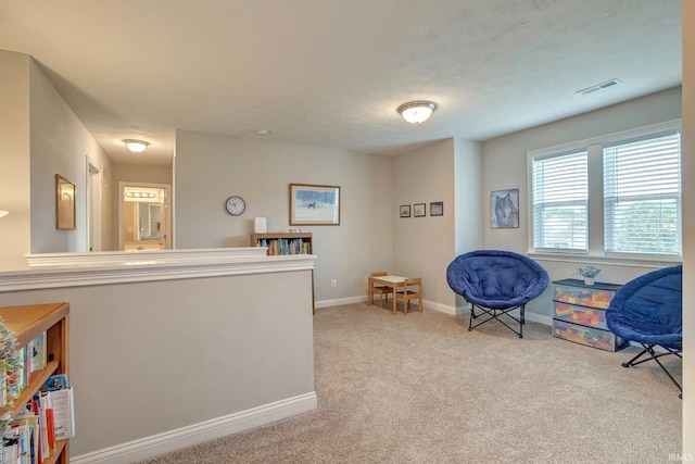 4774 W Hidden Meadow Dr, Bloomington, IN 47404 - living area featuring light carpet and baseboards