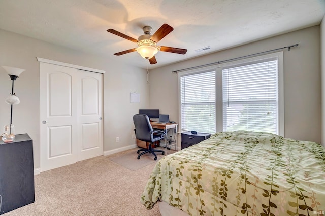 4774 W Hidden Meadow Dr, Bloomington, IN 47404 - bedroom featuring carpet floors, an office area, baseboards, a closet, and ceiling fan