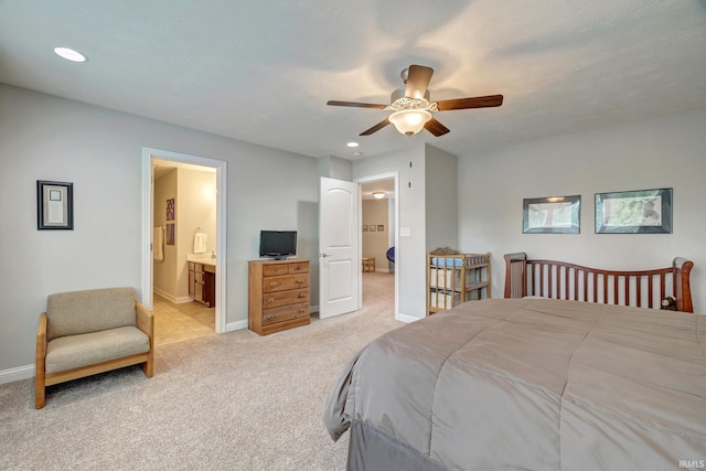 4774 W Hidden Meadow Dr, Bloomington, IN 47404 - bedroom with light carpet, baseboards, recessed lighting, ensuite bathroom, and a ceiling fan