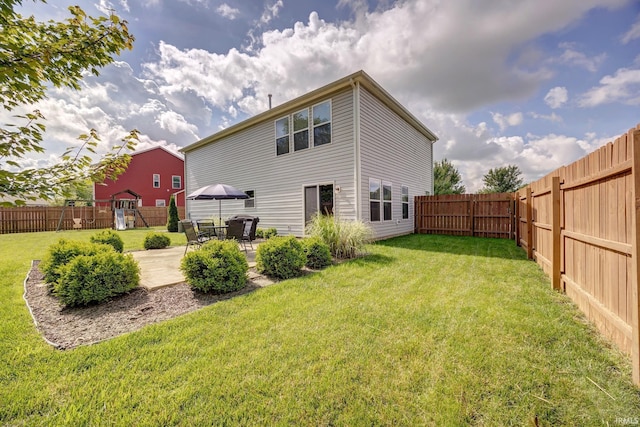 4774 W Hidden Meadow Dr, Bloomington, IN 47404 - back of house with a patio area