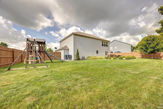 4774 W Hidden Meadow Dr, Bloomington, IN 47404 - view of yard featuring a playground and central AC unit