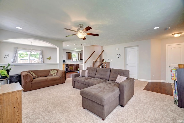 4774 W Hidden Meadow Dr, Bloomington, IN 47404 - living room with carpet, a ceiling fan, stairs, recessed lighting, and baseboards
