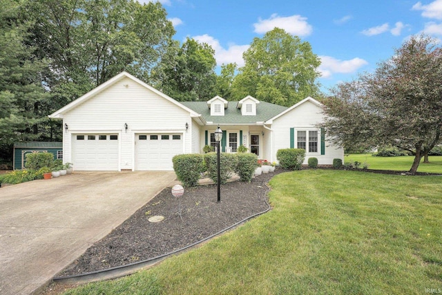 91 Smiths Rd, Mitchell, IN 47446 - view of front of home with concrete driveway, an attached garage, and a front yard