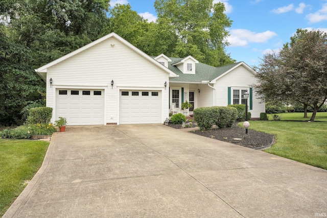 91 Smiths Rd, Mitchell, IN 47446 - view of front of home with concrete driveway, an attached garage, a front lawn, and a shingled roof