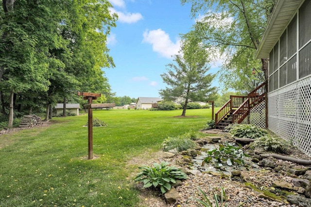 91 Smiths Rd, Mitchell, IN 47446 - view of grassy yard featuring stairway and a sunroom