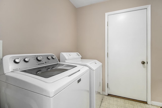 18086 Courtland Dr, South Bend, IN 46637 - laundry room with independent washer and dryer and baseboards