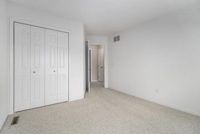 18086 Courtland Dr, South Bend, IN 46637 - unfurnished bedroom with carpet flooring, a closet, and baseboards