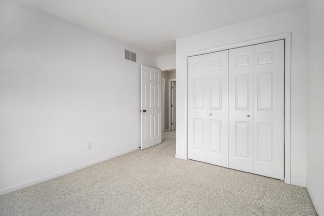 18086 Courtland Dr, South Bend, IN 46637 - unfurnished bedroom with carpet flooring, baseboards, and a closet