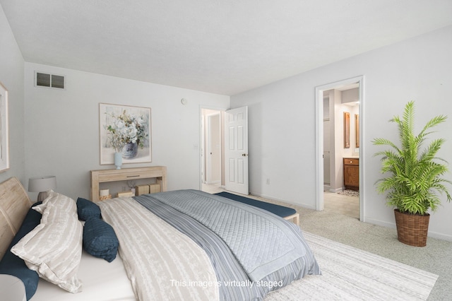 18086 Courtland Dr, South Bend, IN 46637 - bedroom featuring light carpet and connected bathroom