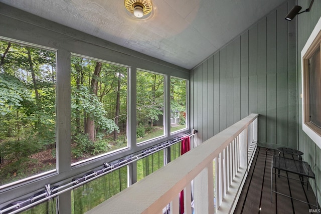 1320 Castle Dr, Lafayette, IN 47905 - unfurnished sunroom with healthy amount of natural light and lofted ceiling