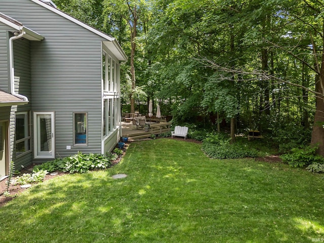 1320 Castle Dr, Lafayette, IN 47905 - view of green lawn featuring a wooden deck