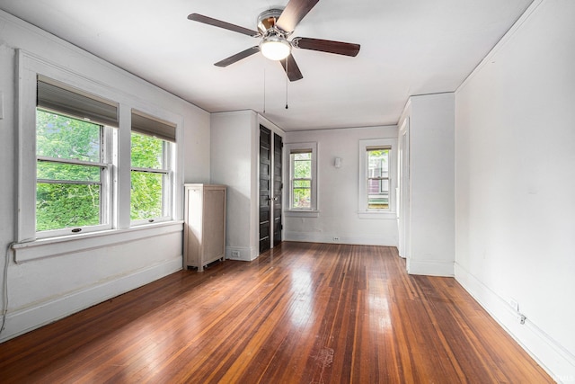 706 Park Ave, South Bend, IN 46616 - unfurnished room with plenty of natural light, wood-type flooring, baseboards, and ceiling fan