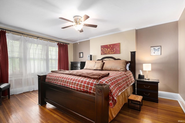 706 Park Ave, South Bend, IN 46616 - bedroom with baseboards, hardwood / wood-style floors, crown molding, and ceiling fan