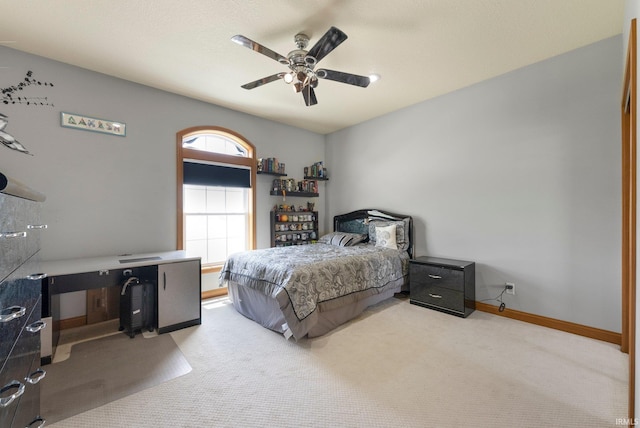 1095 E 600 N, Columbia City, IN 46725 - carpeted bedroom with a ceiling fan and baseboards