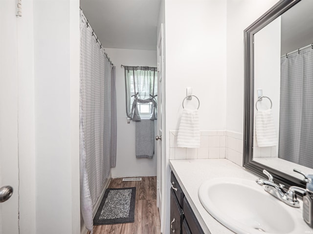 11219 Denzer Rd, Evansville, IN 47712 - bathroom with vanity and wood finished floors
