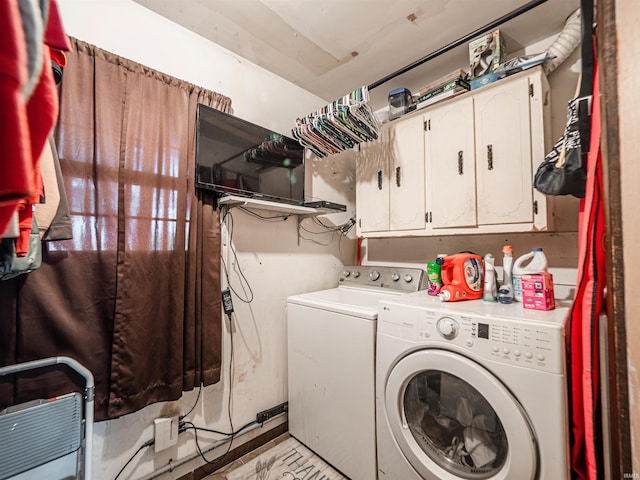 11219 Denzer Rd, Evansville, IN 47712 - washroom with washing machine and clothes dryer and cabinet space